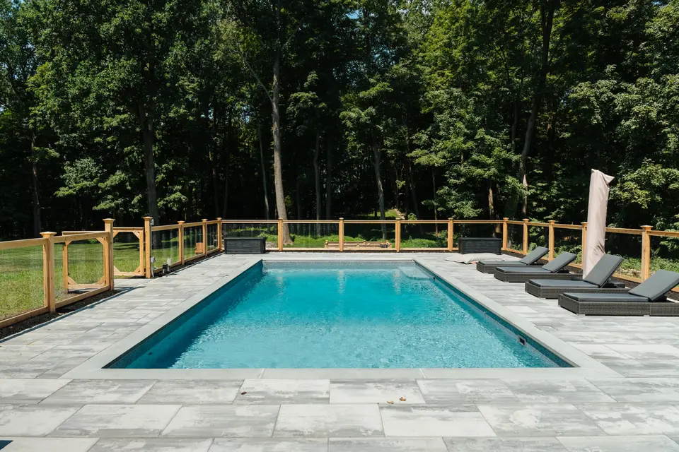 Pool and deck, turquoise water, loungers — Exterior Services LLC, Redding, CT